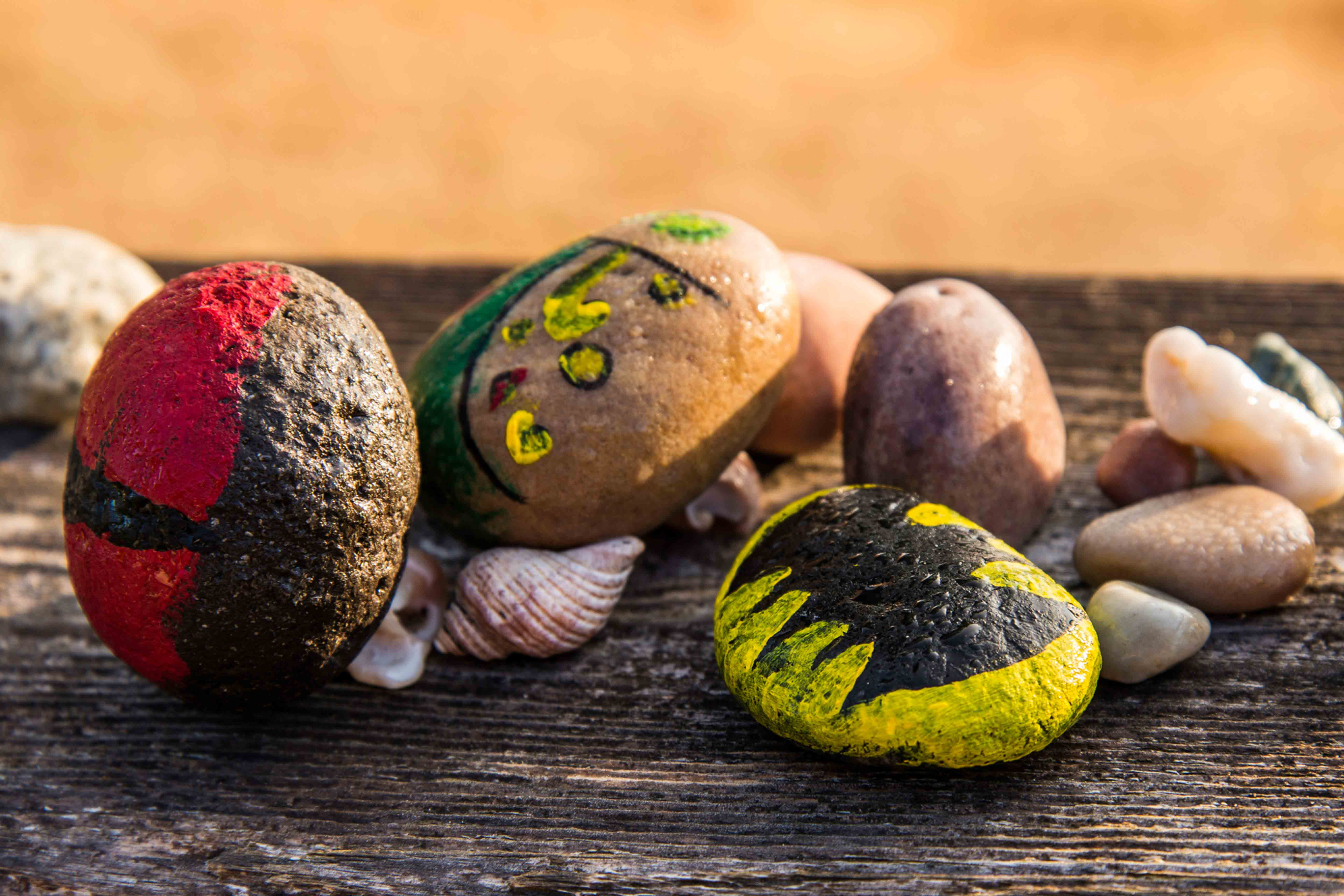 InnocentDrinks, painted pebbles