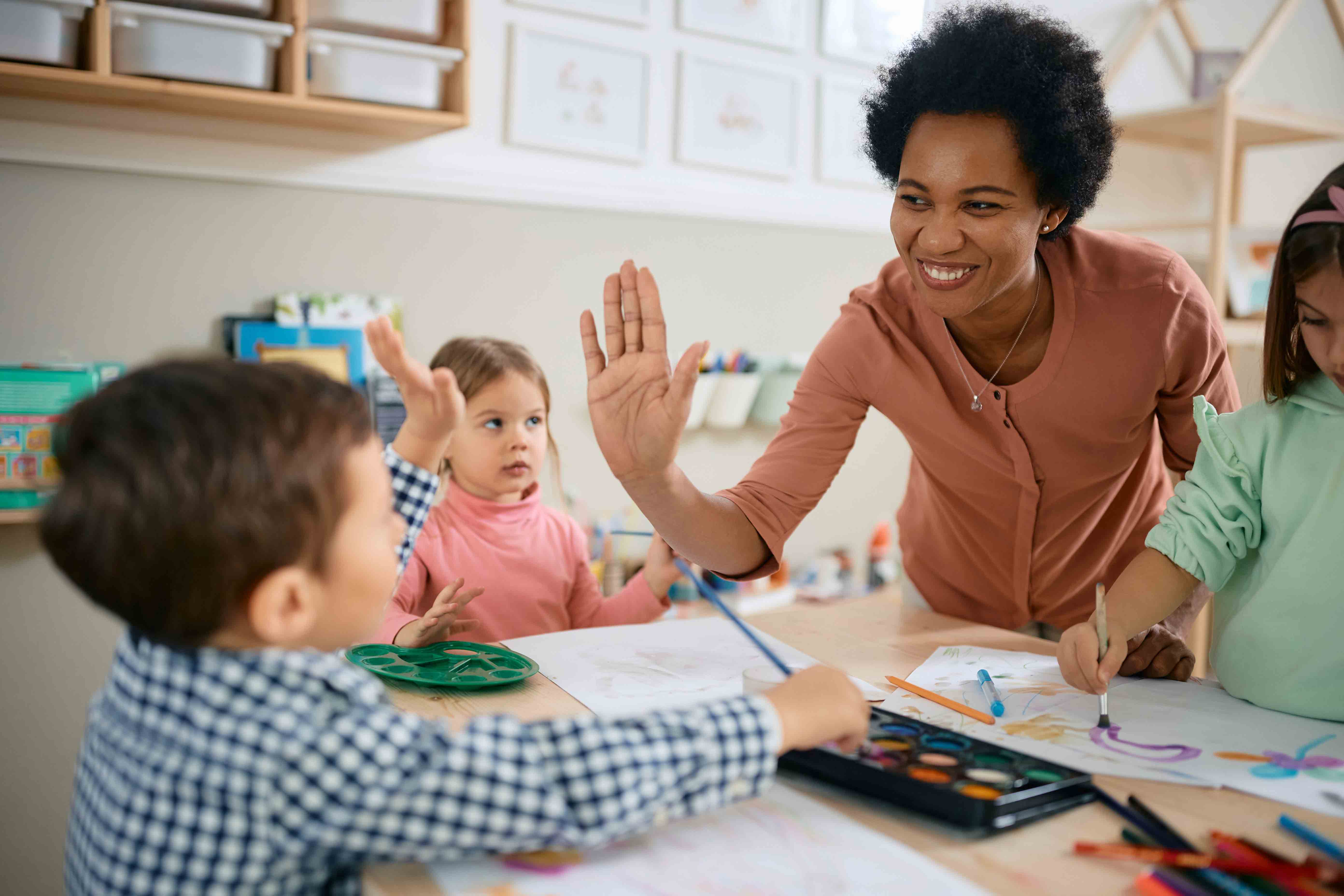 InnocentDrinks, child and adult woman high fiving